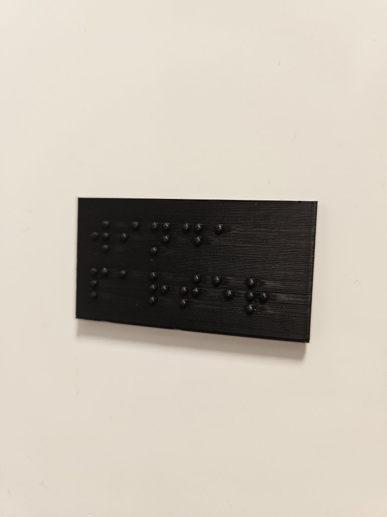 Zdjęcie przedstawia tablica Braille'a dla niewidomych. 